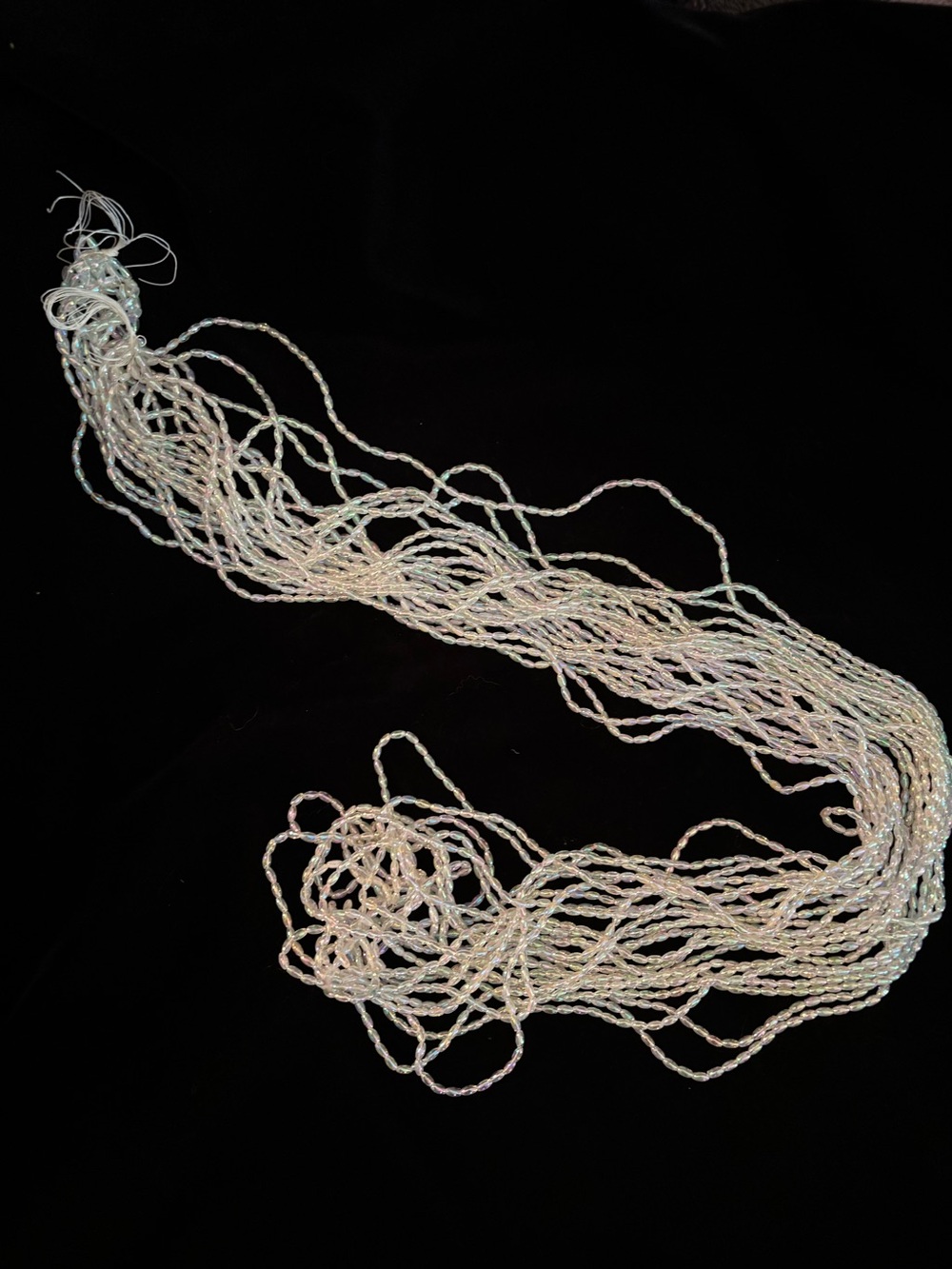 Iridescent multi strand Seed Bead - for sewing or jewelry making.